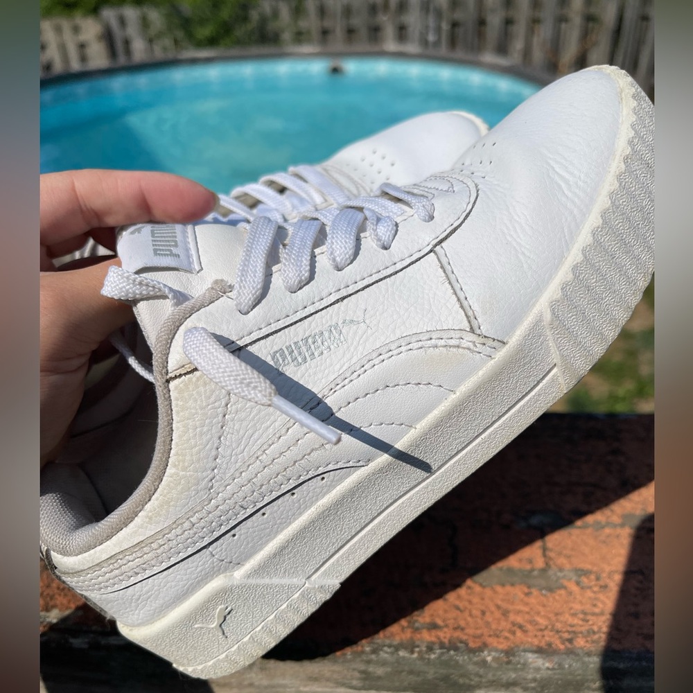 White puma trainers